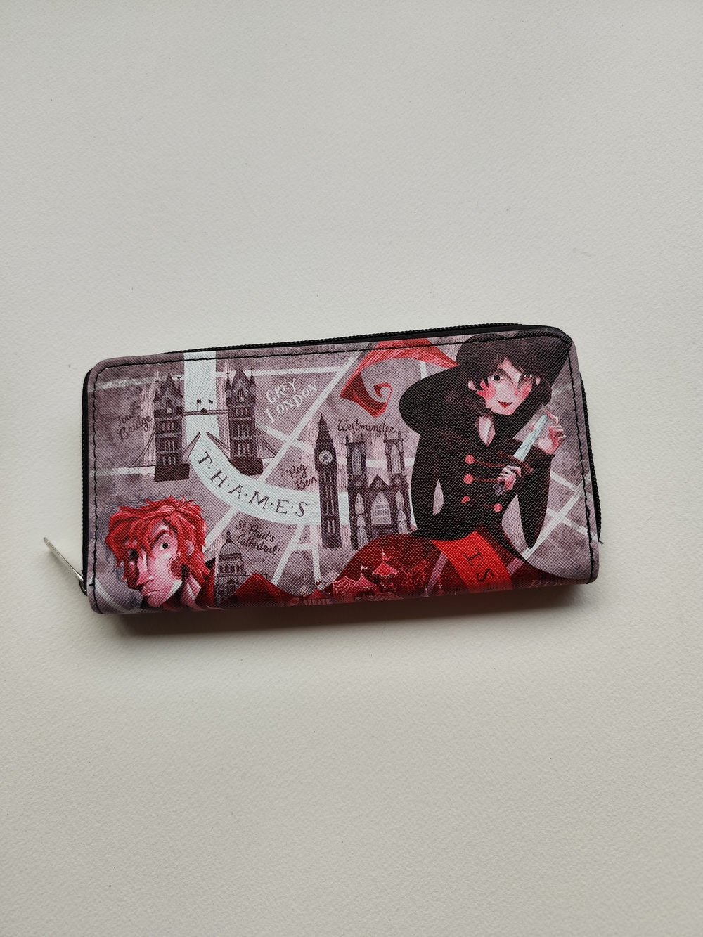 4/$50⭐️A Darker Shade of Magic inspired zip-around wallet